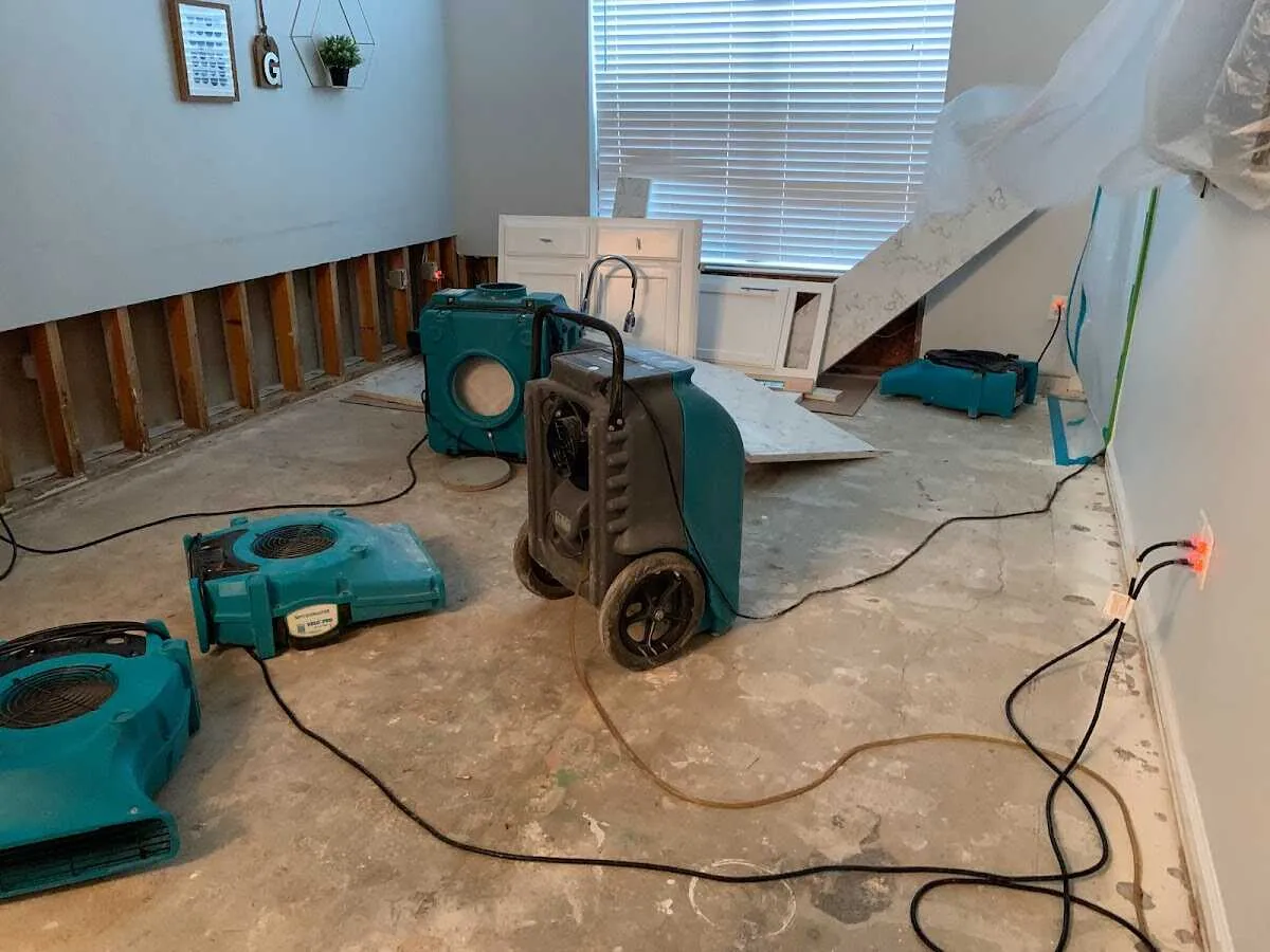 Dehumidifier in flood-cut room for Water Damage Restoration in Fridley